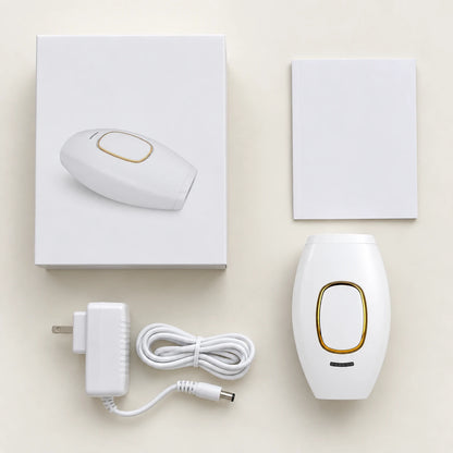 Contenido de la caja: depiladora IPL, adaptador con cable, manual y caja
